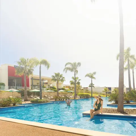 NH Hotels ad: Your Summer Escape Awaits