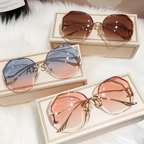 Temu Europe ad: Stylish Irregular Rimless Sunglasses Oversized Gradient Color Metal Sunshade…
