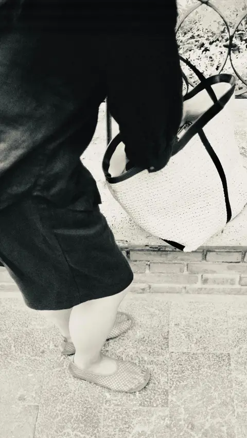ARKET ad: Sea breeze, sitting outside, iced latte, legs out, and a straw bag — that’s my…